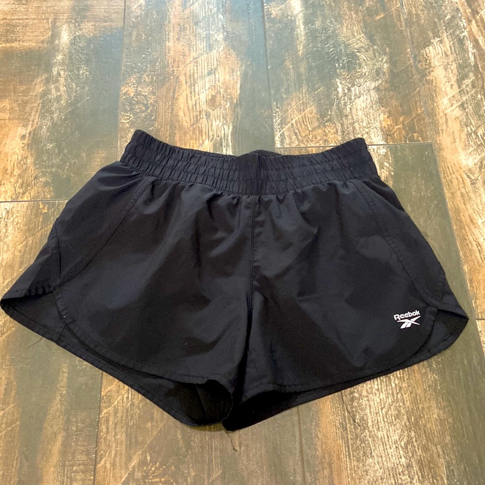 Reebok running shorts.